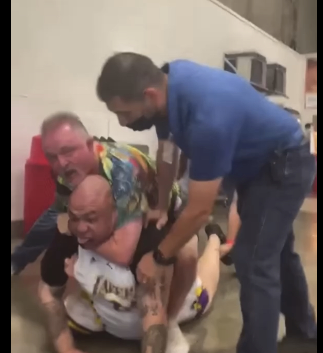 Costco employee and customer fighting